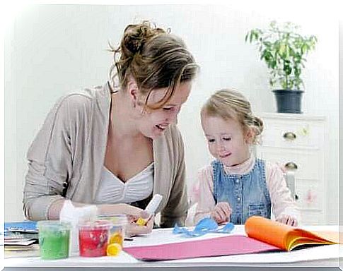 mother and daughter doing handicrafts