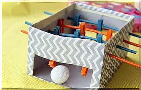A mini homemade table football in recyclable material manual activities.