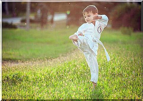 A child practices the gestures