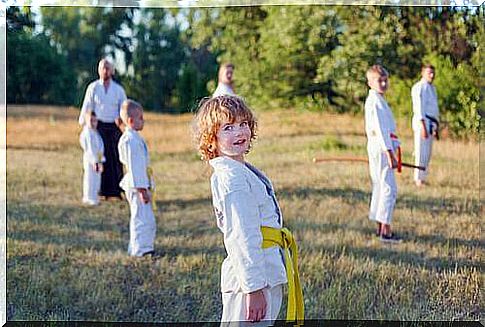 Children practice karate