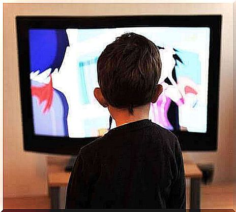 A child in front of the television.