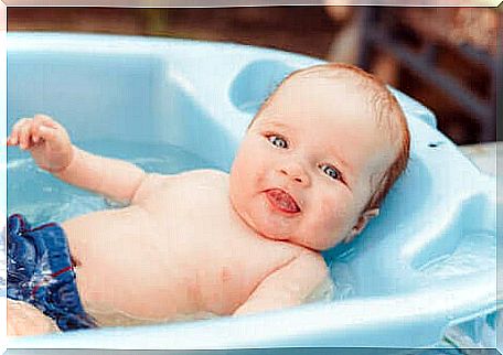 A baby in his bathtub.