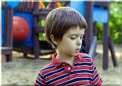 Children talking to themselves in a park.