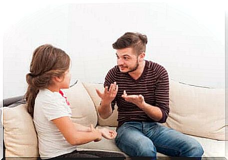 A father talking to his daughter. 