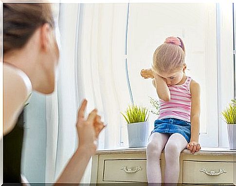 Mother talking to her daughter