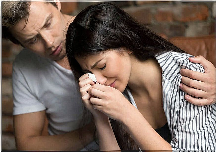 A couple going through mourning following a spontaneous abortion