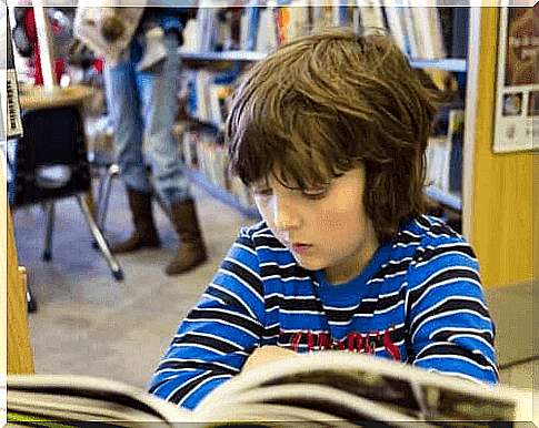 kid reading comic book