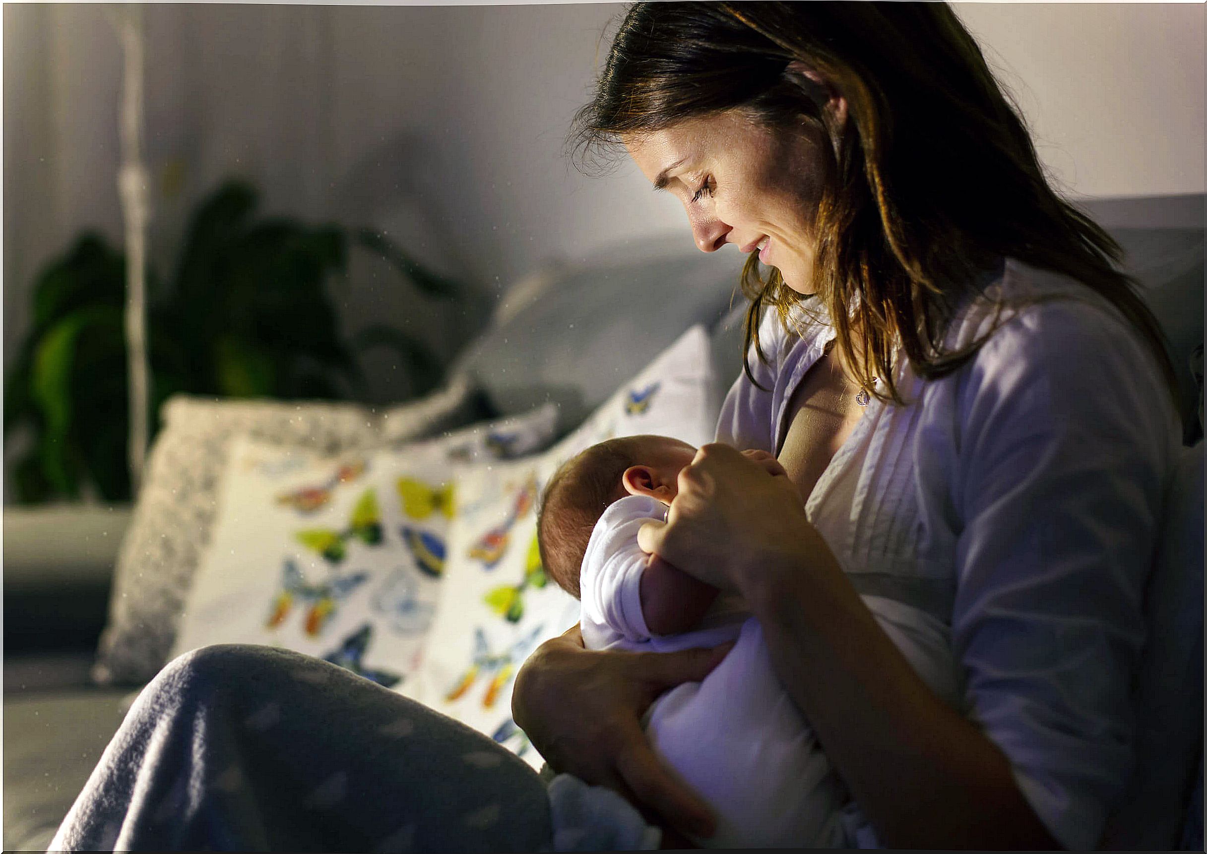 A mother breastfeeding her baby.