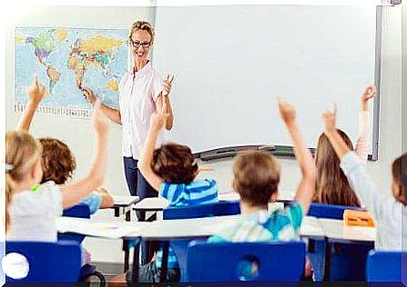 A teacher in class with her students